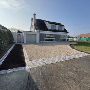 Gravel With Granite Cobble Border in Sutton